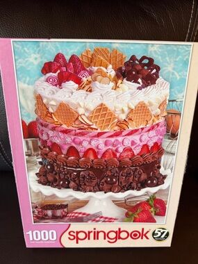 Springbok icing on the cake jigsaw puzzle.  1000 pieces.  Like new